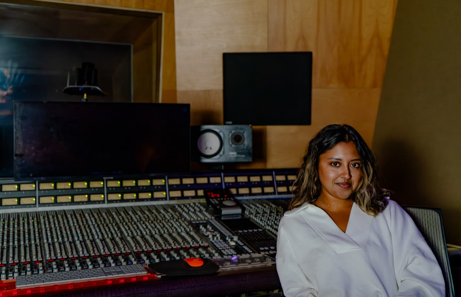 Becca Rashid at the mixing console